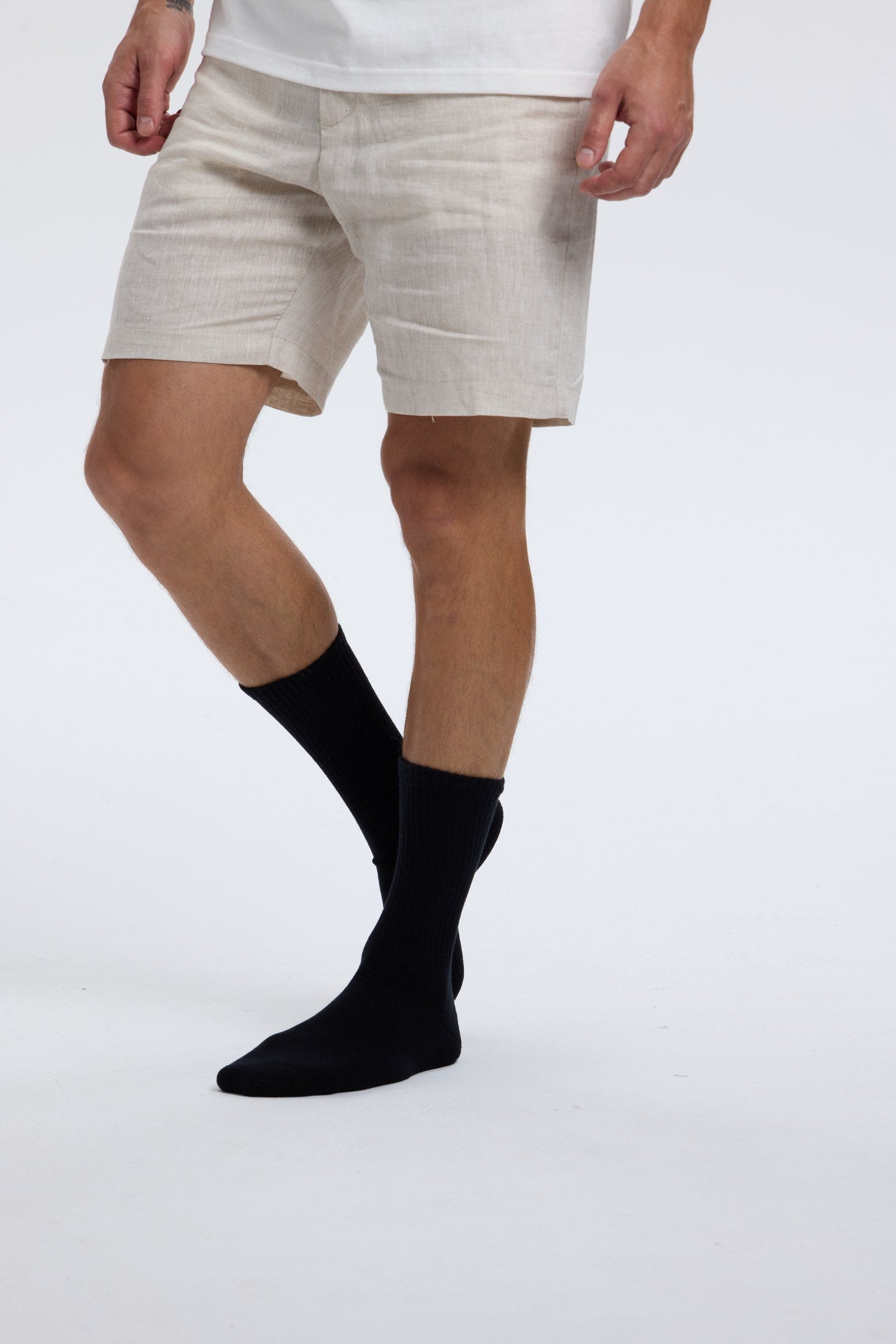 Black Base Supply crew socks worn in motion