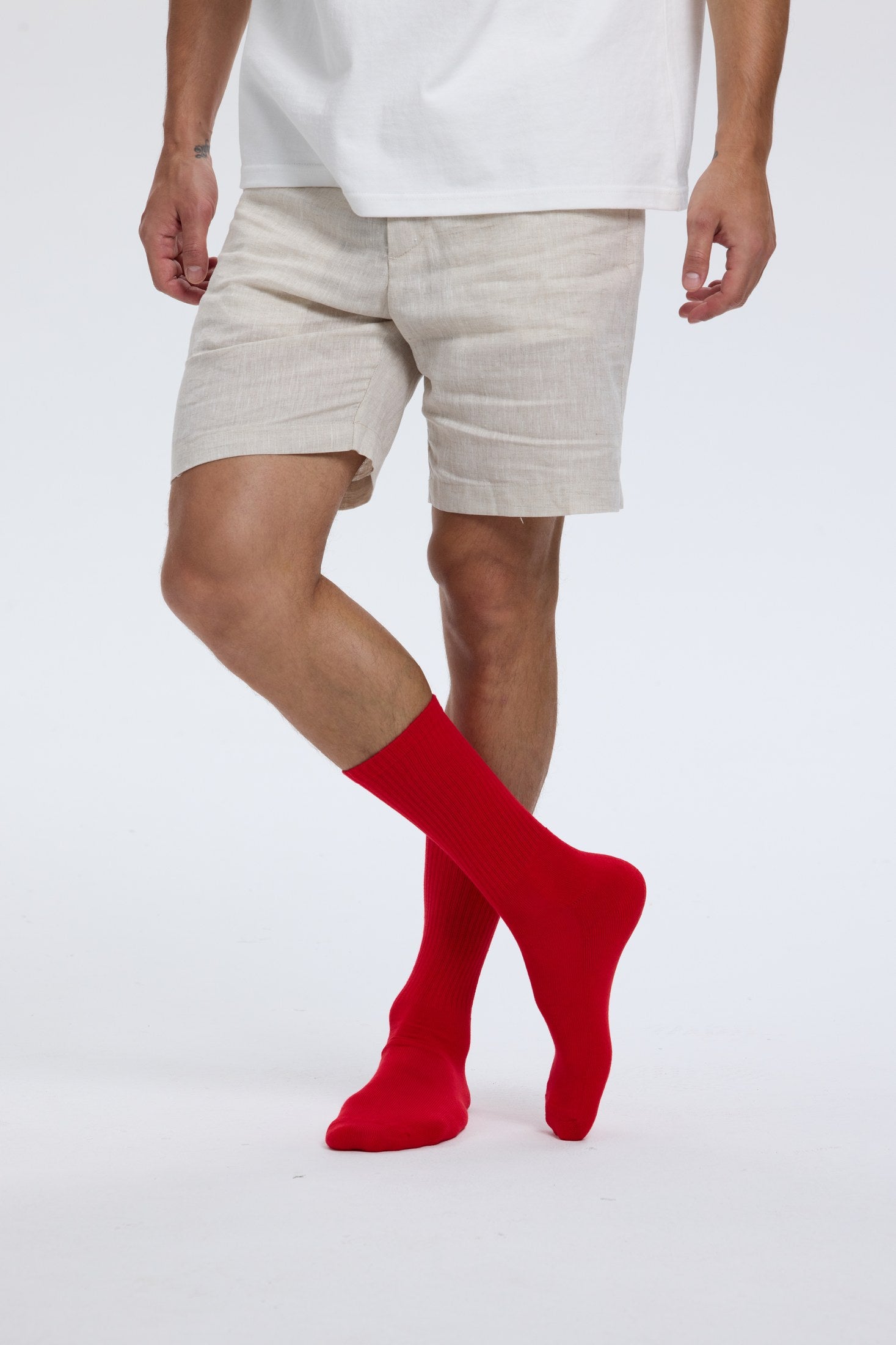 Model styling red Base Supply crew socks
